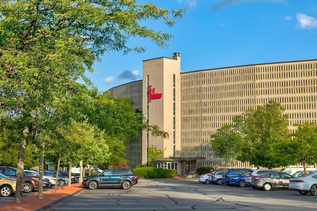 200 Swanton Street, Unit T28 Winchester, MA 01890 - Photo 12 of 34 a car parked in front of a building