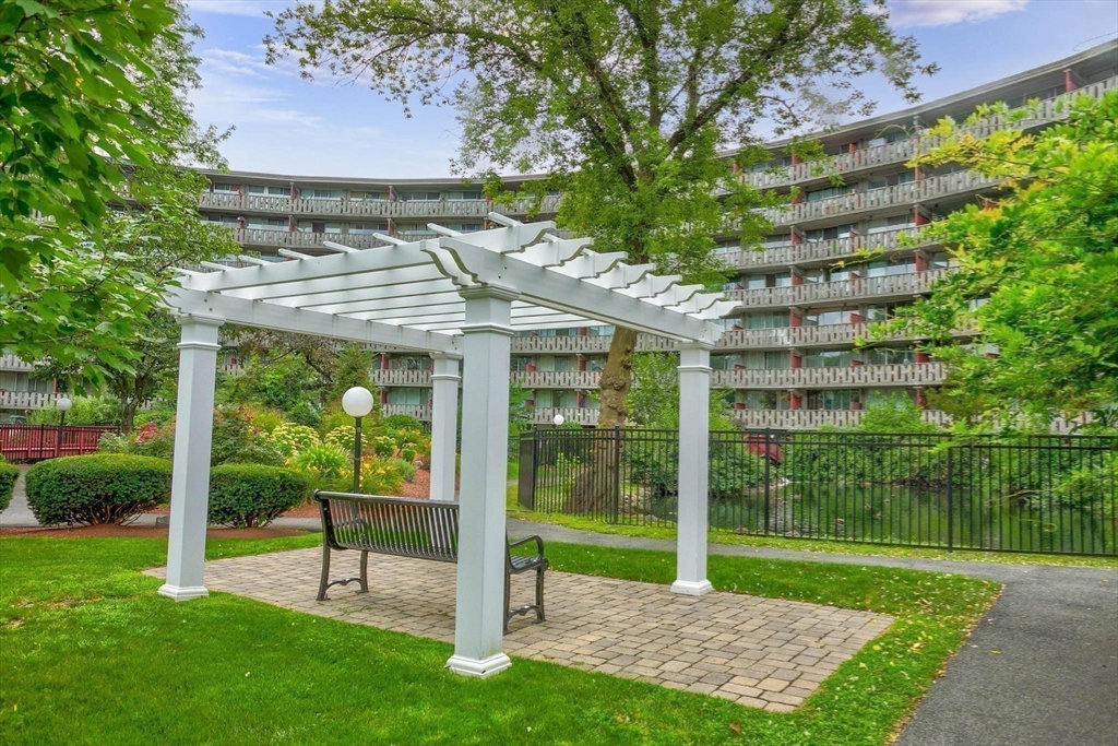 200 Swanton Street, Unit T28 Winchester, MA 01890 - Photo 22 of 34 a view of a chair and table in the garden