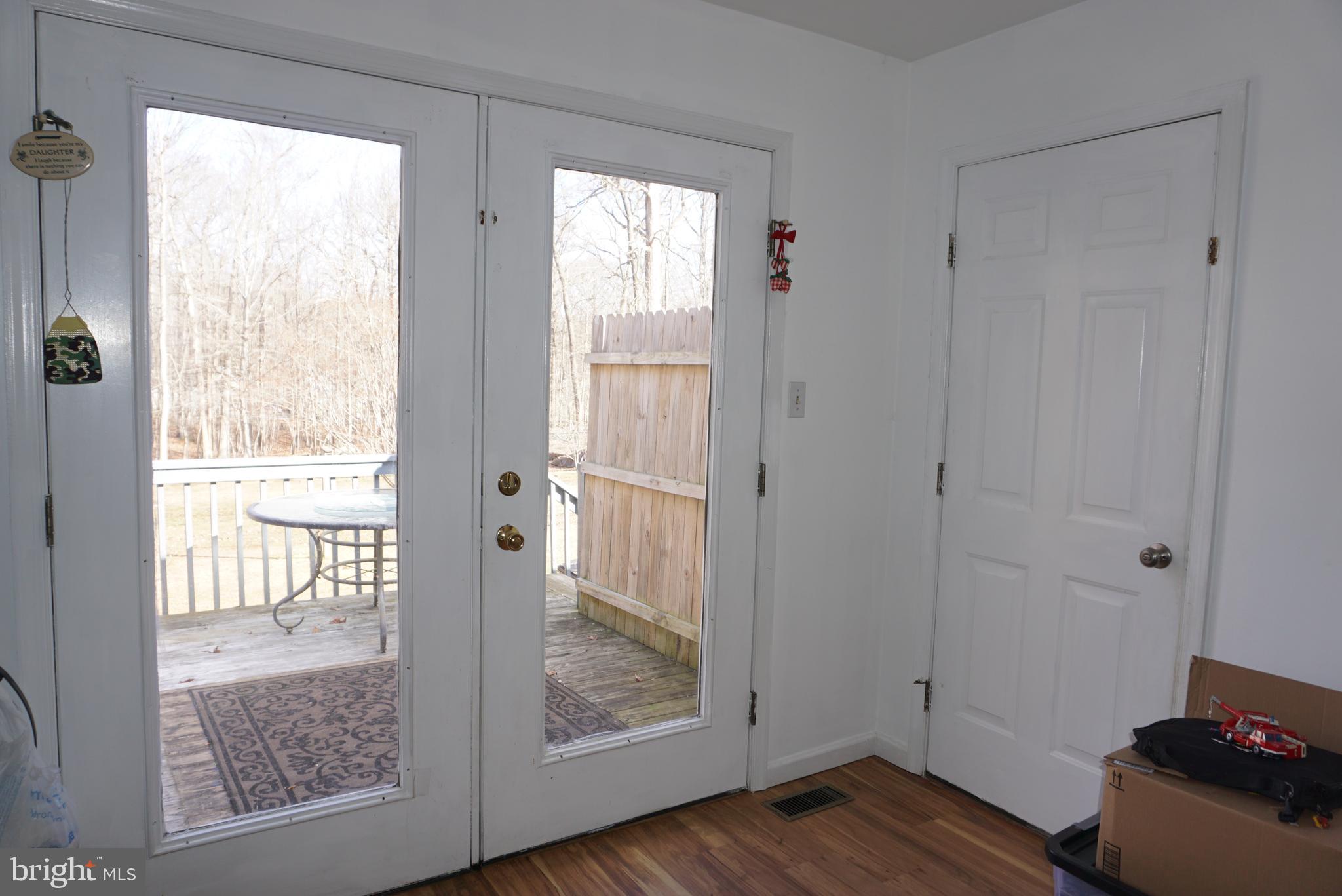 1001 Nottingham Road Elkton, MD 21921 - Photo 11 of 20 a view of a room with wooden floor and windows