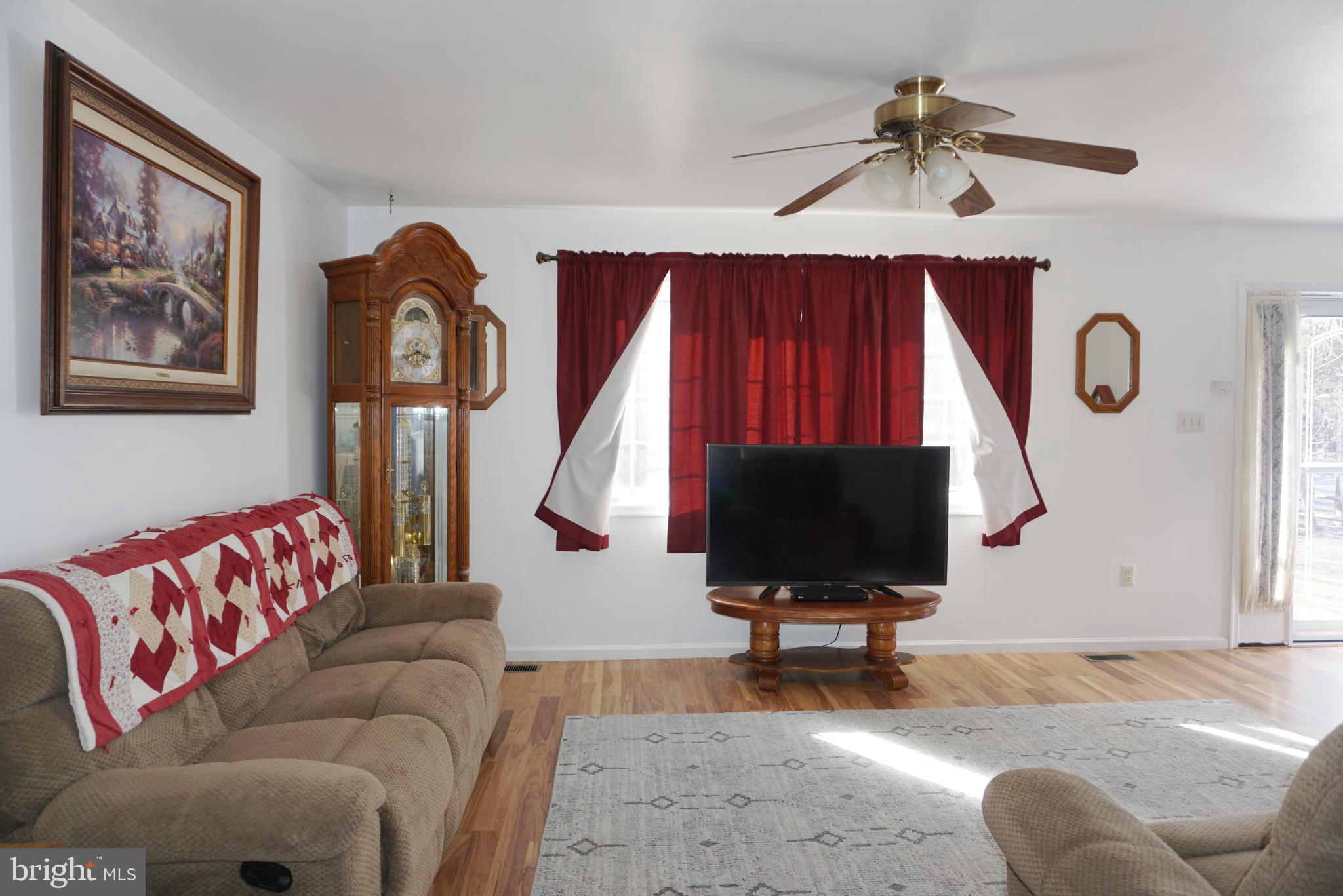 1001 Nottingham Road Elkton, MD 21921 - Photo 6 of 20 a living room with furniture and a flat screen tv