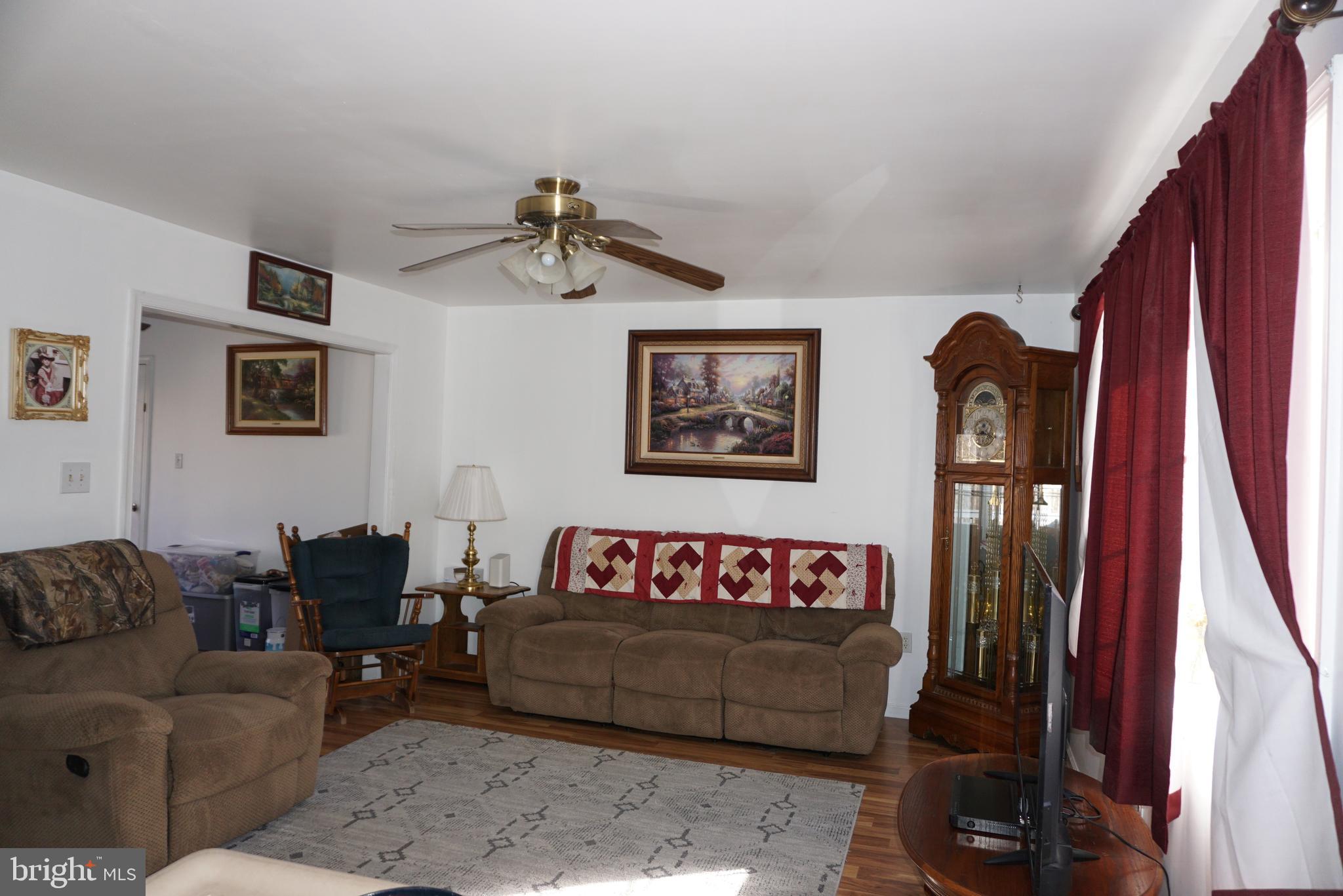 1001 Nottingham Road Elkton, MD 21921 - Photo 7 of 20 a living room with furniture and a flat screen tv