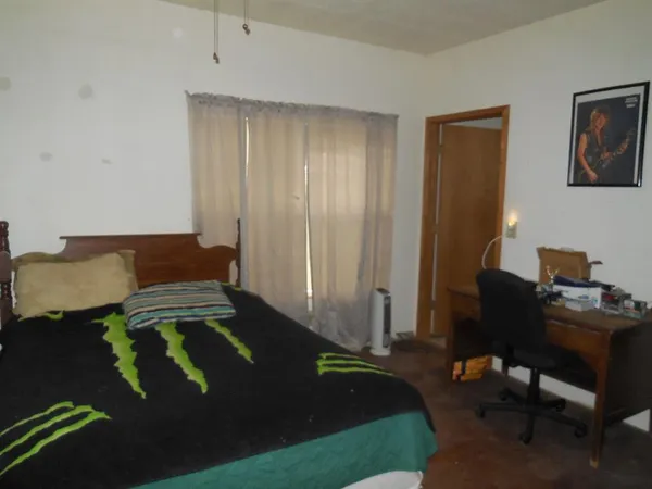 a view of a room that has a window in it