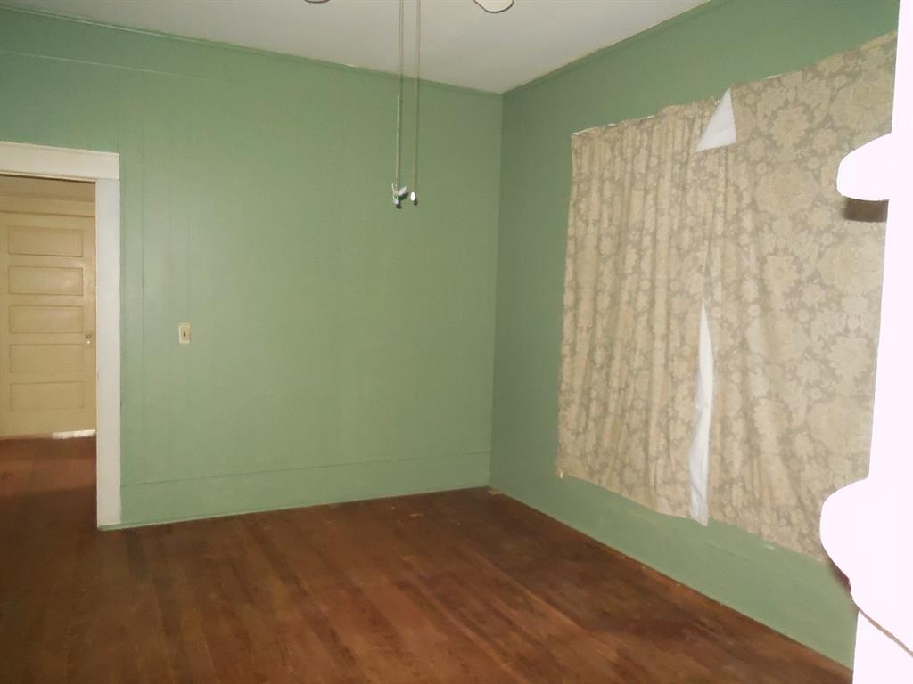 910 Sinclair Street Ranger, TX 76470 - Photo 19 of 21 a view of a room that has a window in it