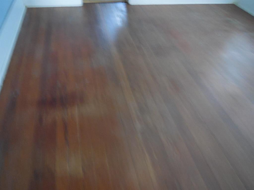 910 Sinclair Street Ranger, TX 76470 - Photo 6 of 21 a empty room with wooden floor