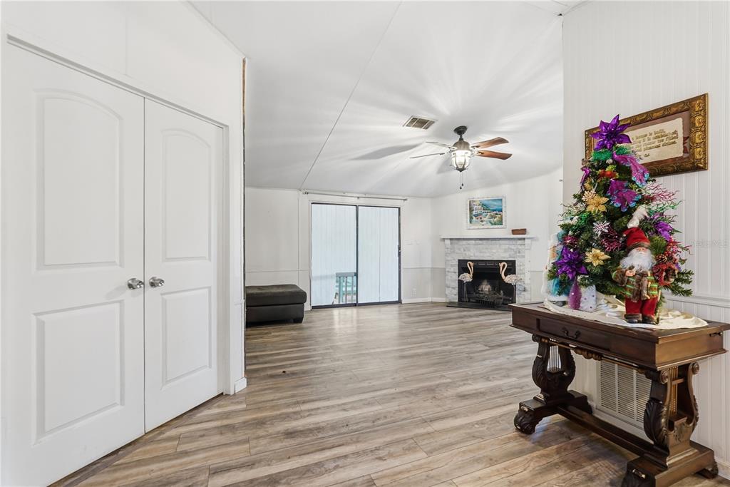 1205 Calvary Road Holiday, FL 34691 - Photo 11 of 34 a view of a workspace with furniture and a ceiling fan