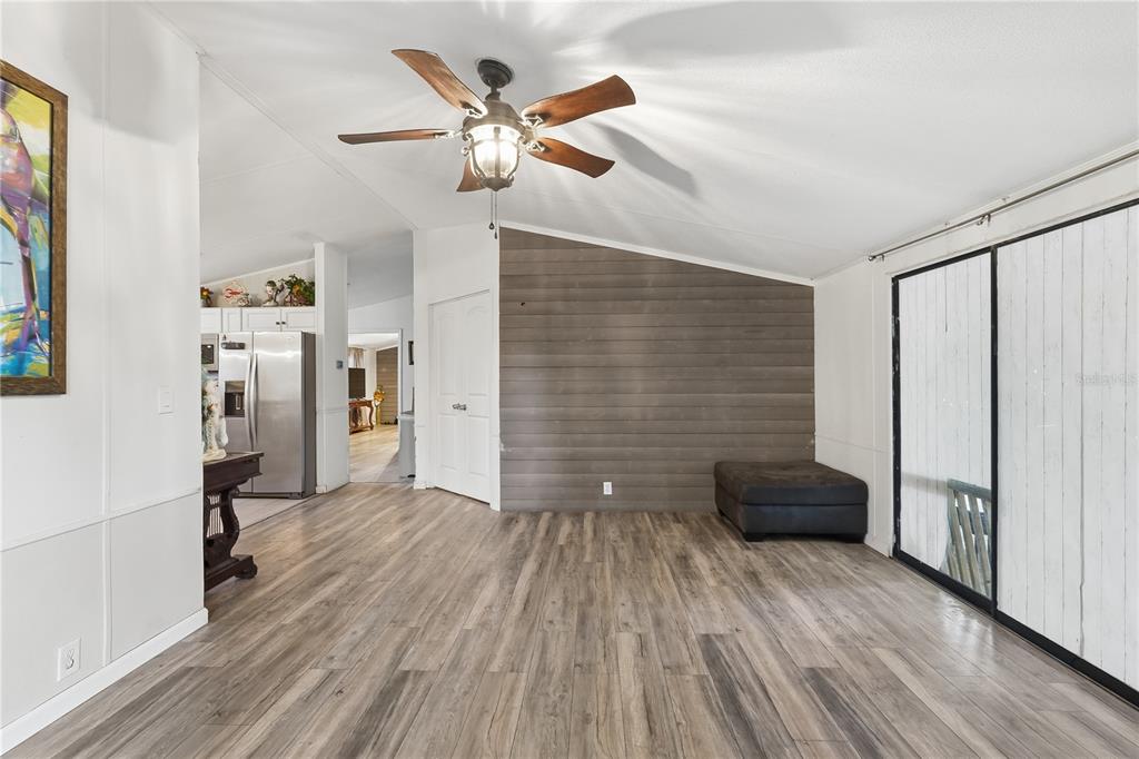 1205 Calvary Road Holiday, FL 34691 - Photo 13 of 34 a view of a livingroom with wooden floor