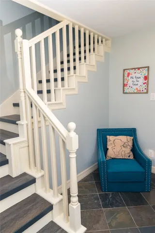 a spacious bedroom with a bed and a table in it
