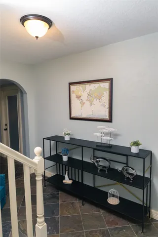 a bedroom with bed and window