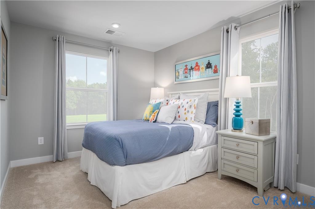 10648 Wrexham Townes View Chesterfield, VA 23832 - Photo 12 of 15 a bedroom with a bed and a window