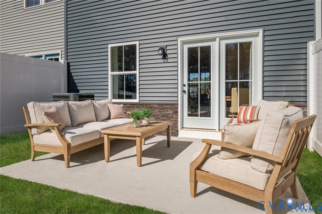 10648 Wrexham Townes View Chesterfield, VA 23832 - Photo 14 of 15 a building outdoor space with patio furniture