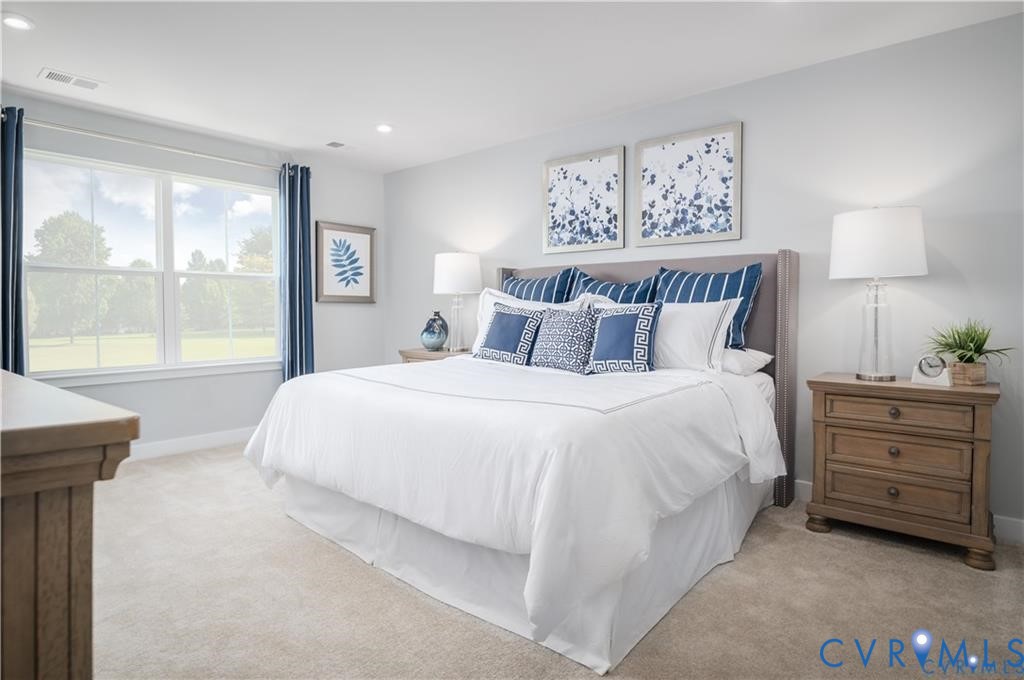 10648 Wrexham Townes View Chesterfield, VA 23832 - Photo 7 of 15 a bedroom with a bed and a window