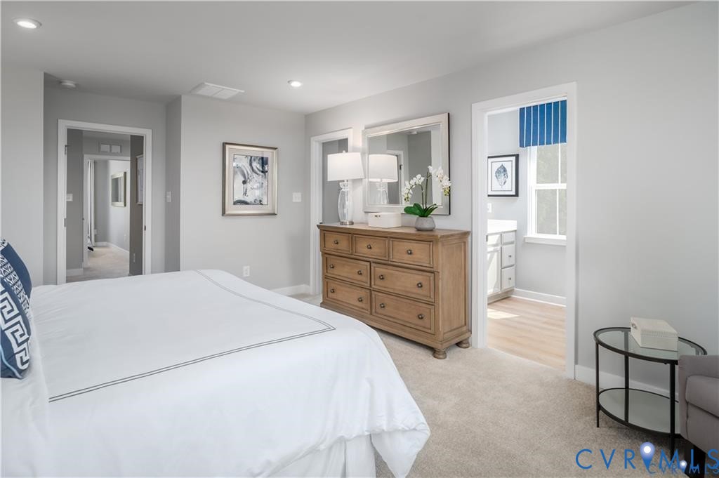 10648 Wrexham Townes View Chesterfield, VA 23832 - Photo 9 of 15 a bedroom with a bed and a window