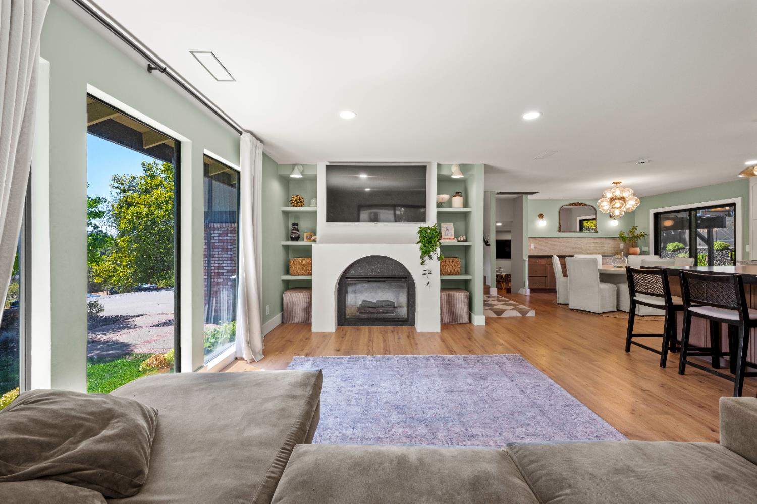 7945 Callison Road Penryn, CA 95663 - Photo 11 of 70 a living room with furniture a window and a fireplace