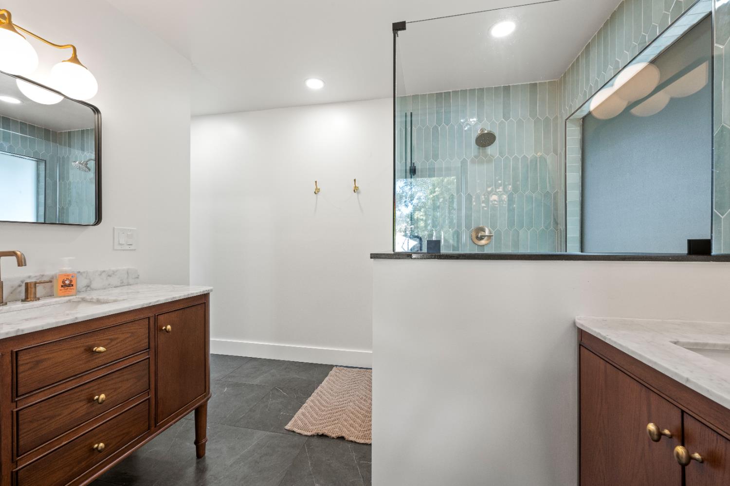 7945 Callison Road Penryn, CA 95663 - Photo 26 of 70 a bathroom with a sink and a mirror