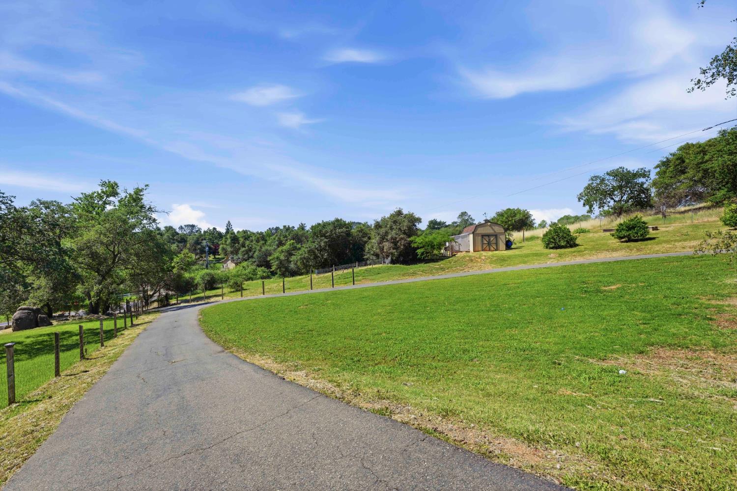 7945 Callison Road Penryn, CA 95663 - Photo 59 of 70 a view of a golf course with a lake