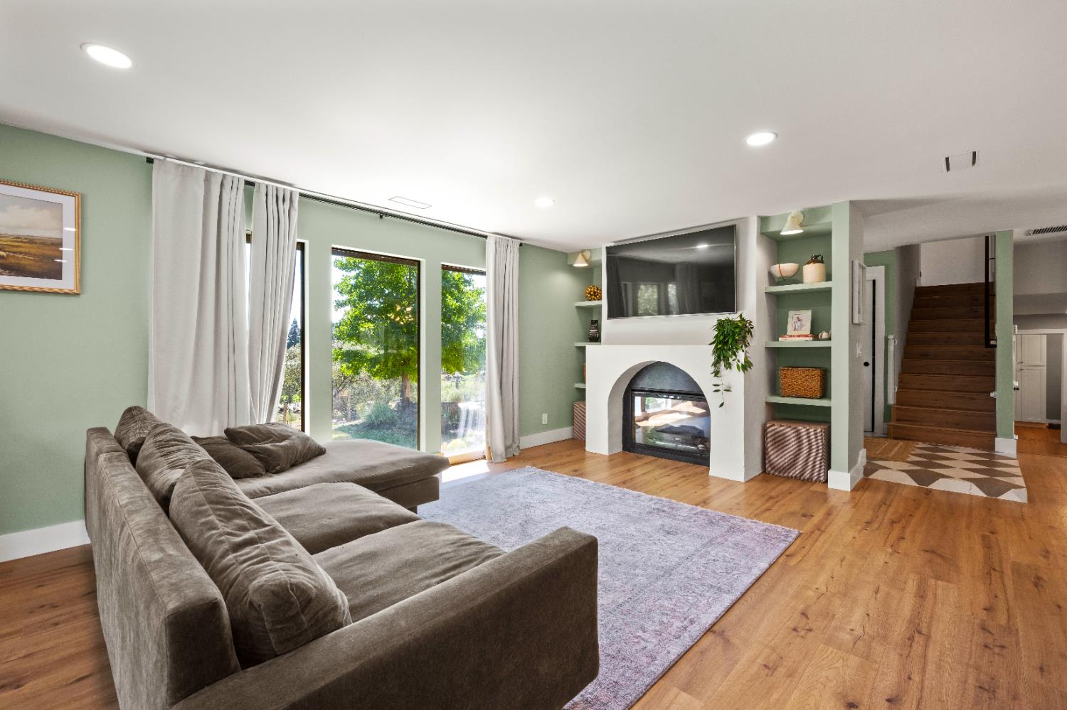 7945 Callison Road Penryn, CA 95663 - Photo 10 of 70 a living room with furniture and a fireplace