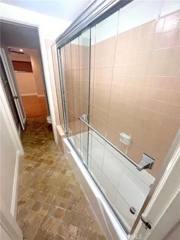 a view of a yard with table and chairs