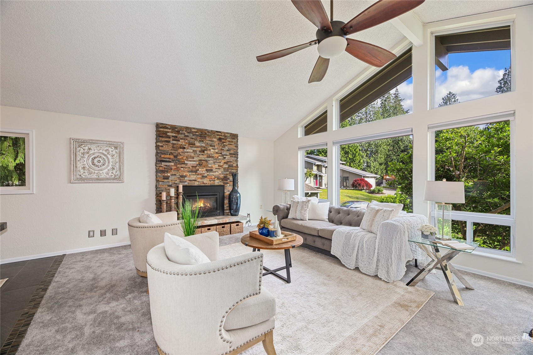 16624 22nd Avenue Southeast Bothell, WA 98012 - Photo 2 of 39 a living room with furniture a large window and a rug
