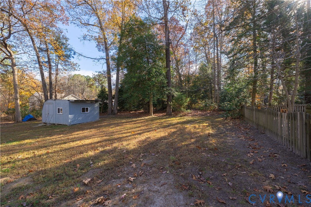 247 Tranquility Drive Ruther Glen, VA 22546 - Photo 11 of 50 a view of a house with large trees