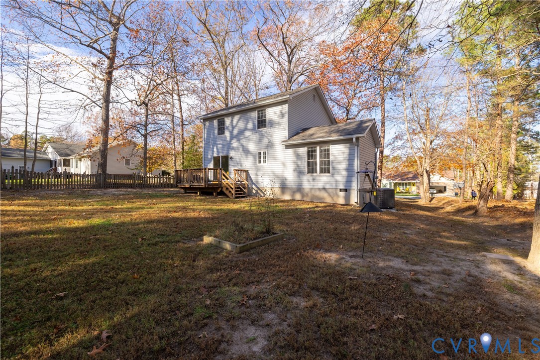 247 Tranquility Drive Ruther Glen, VA 22546 - Photo 13 of 50 a view of a street with big trees