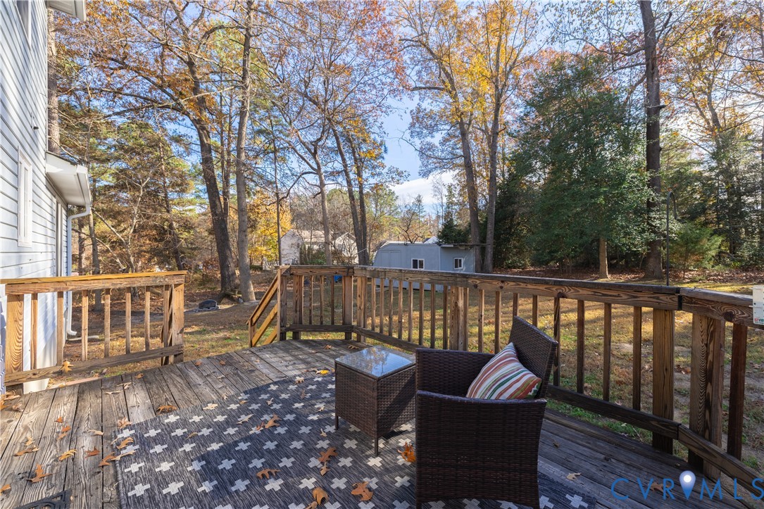 247 Tranquility Drive Ruther Glen, VA 22546 - Photo 15 of 50 a view of a two chairs on the deck