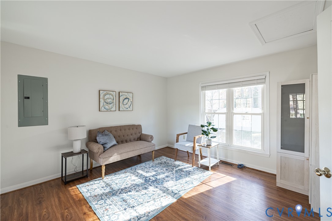 247 Tranquility Drive Ruther Glen, VA 22546 - Photo 30 of 50 a living room with furniture and wooden floor