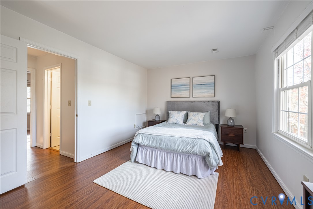 247 Tranquility Drive Ruther Glen, VA 22546 - Photo 38 of 50 a bedroom with a bed and a window