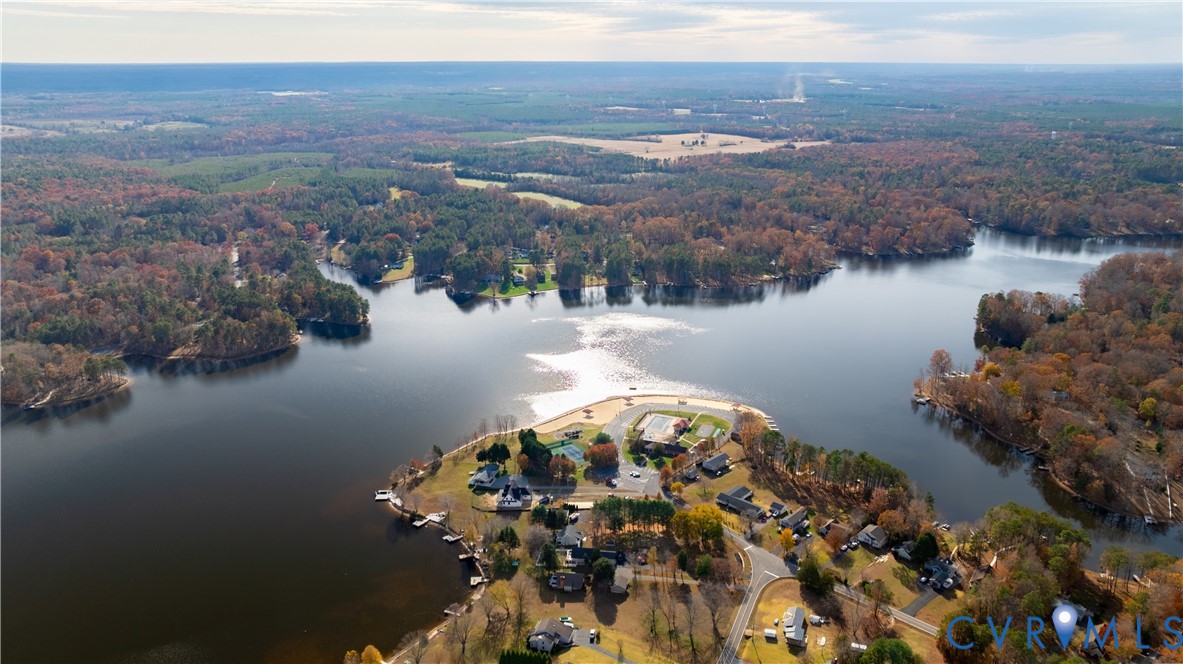 247 Tranquility Drive Ruther Glen, VA 22546 - Photo 43 of 50 a view of a lake in middle of forest