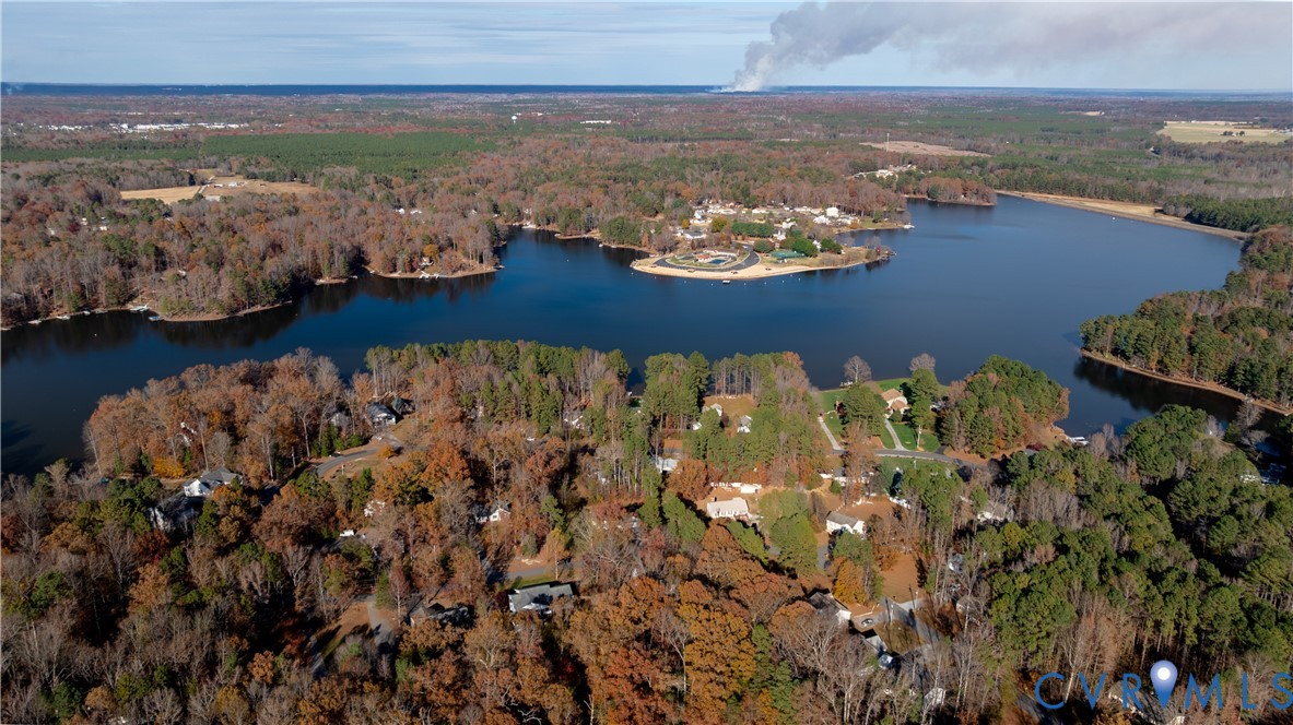 247 Tranquility Drive Ruther Glen, VA 22546 - Photo 44 of 50 an aerial view of ocean and residential houses with outdoor space