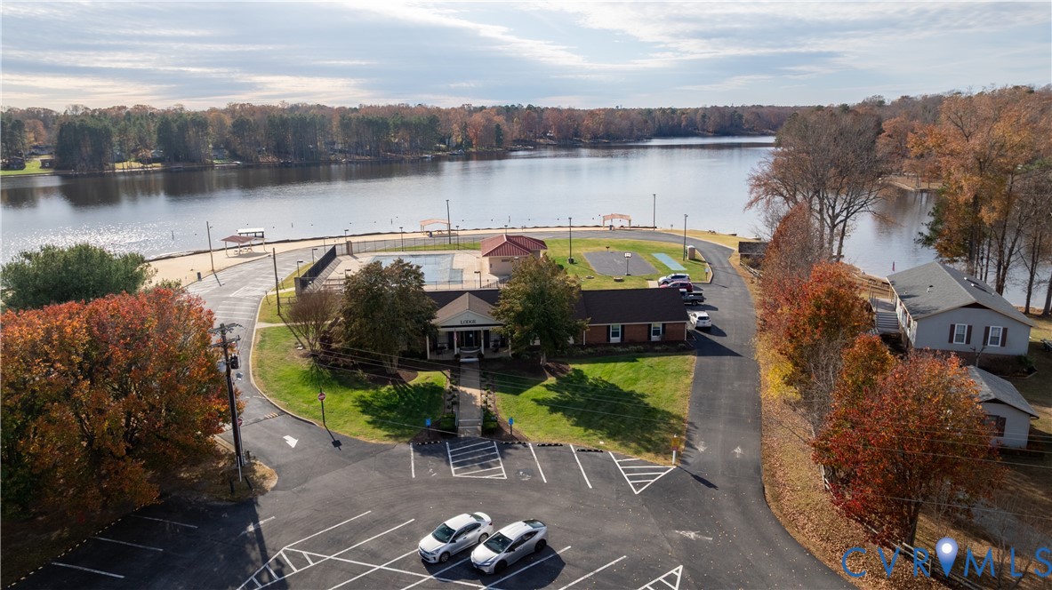 247 Tranquility Drive Ruther Glen, VA 22546 - Photo 45 of 50 a view of a lake with sitting area