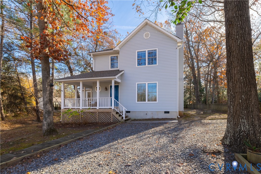 247 Tranquility Drive Ruther Glen, VA 22546 - Photo 5 of 50 a view of a house with a yard