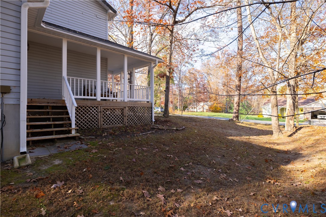 247 Tranquility Drive Ruther Glen, VA 22546 - Photo 6 of 50 a view of a house with a yard
