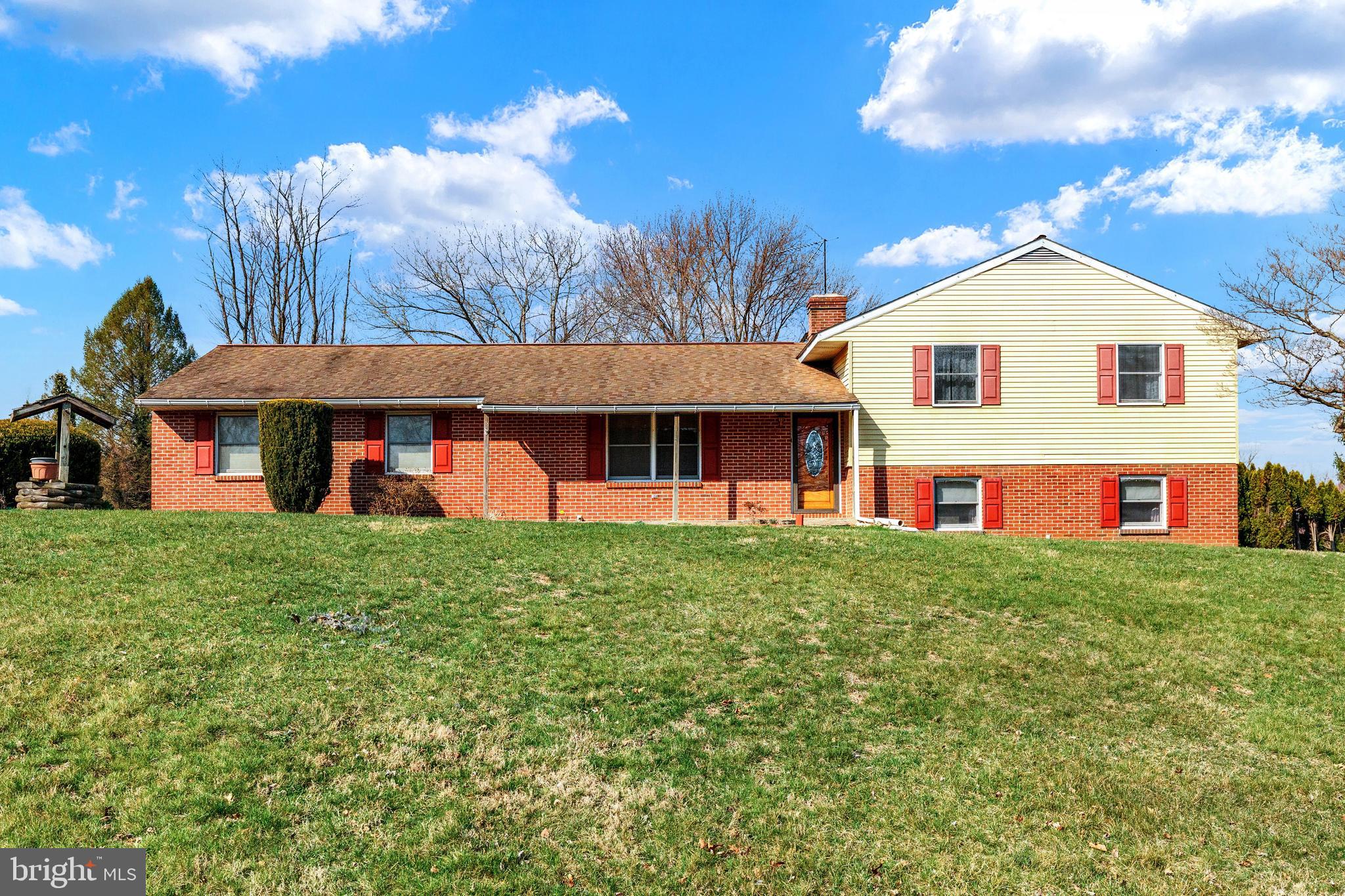 41 Apache Lane Willow Street, PA 17584 - Photo 1 of 26 a front view of a house with a yard