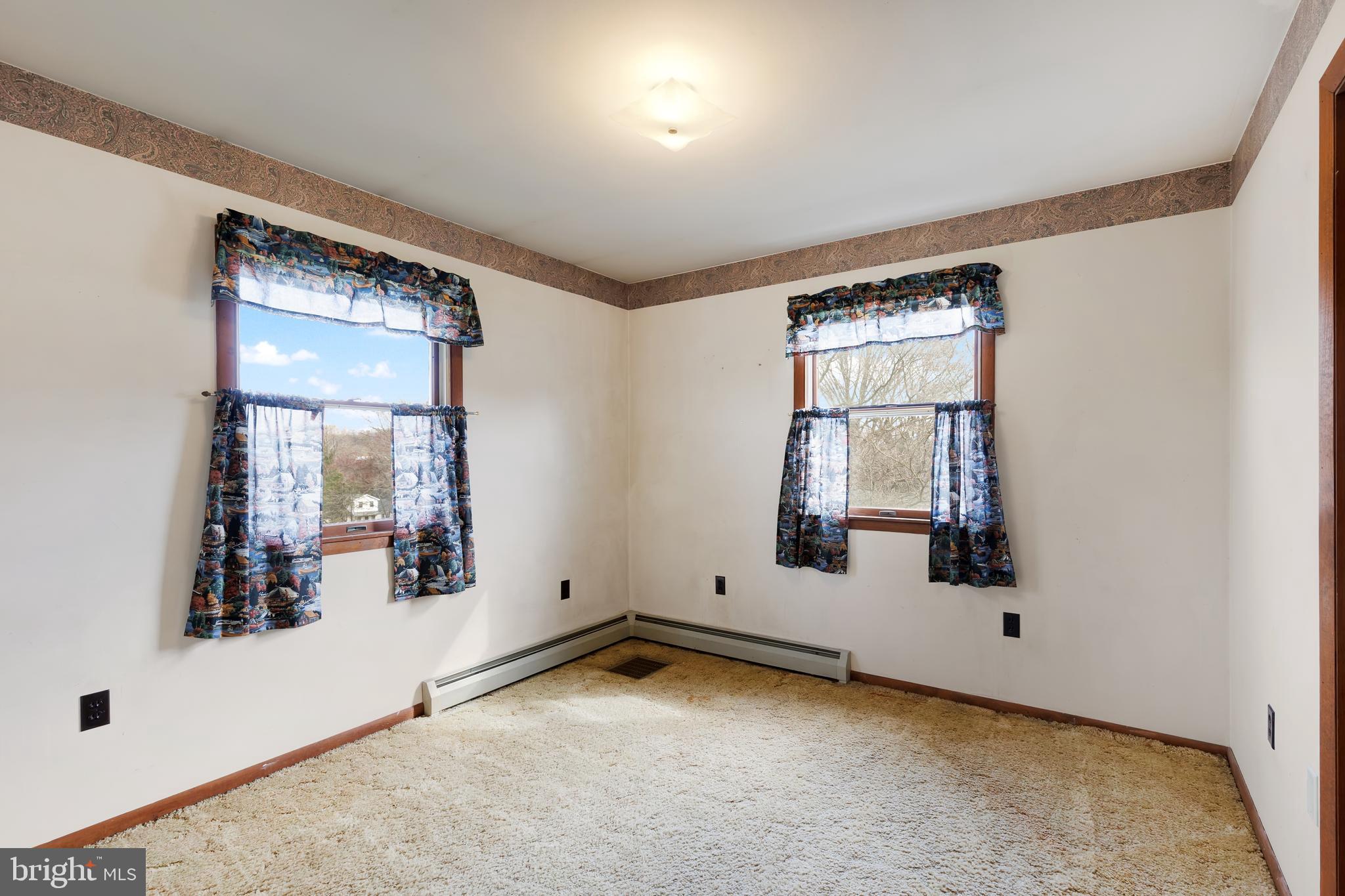 41 Apache Lane Willow Street, PA 17584 - Photo 11 of 26 an empty room with windows and mirror
