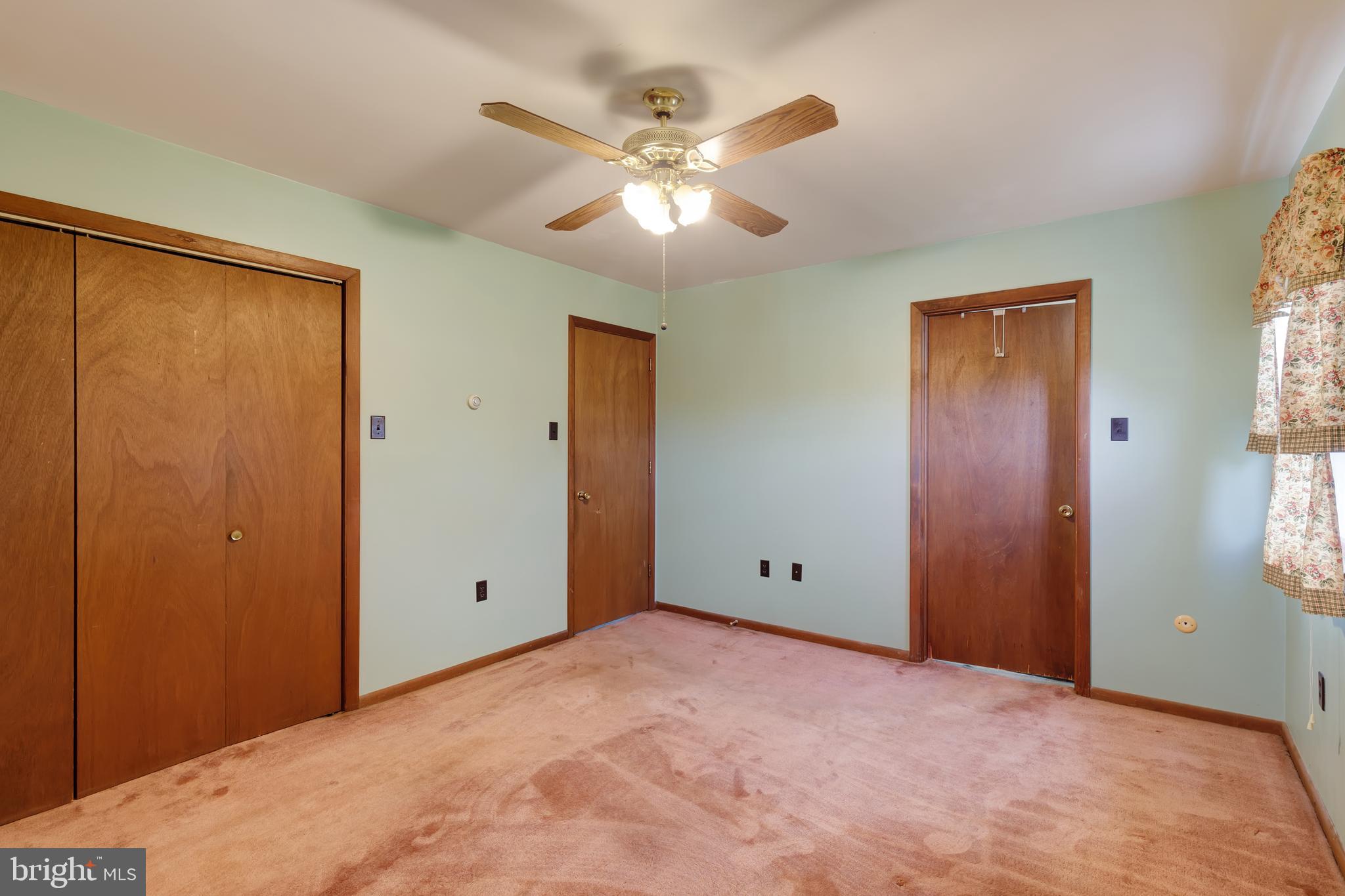 41 Apache Lane Willow Street, PA 17584 - Photo 9 of 26 a view of an empty room with window and wooden floor