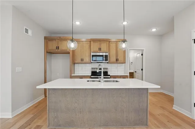 $364,950 | 719 Glenn Circle, Raymore, MO 64083