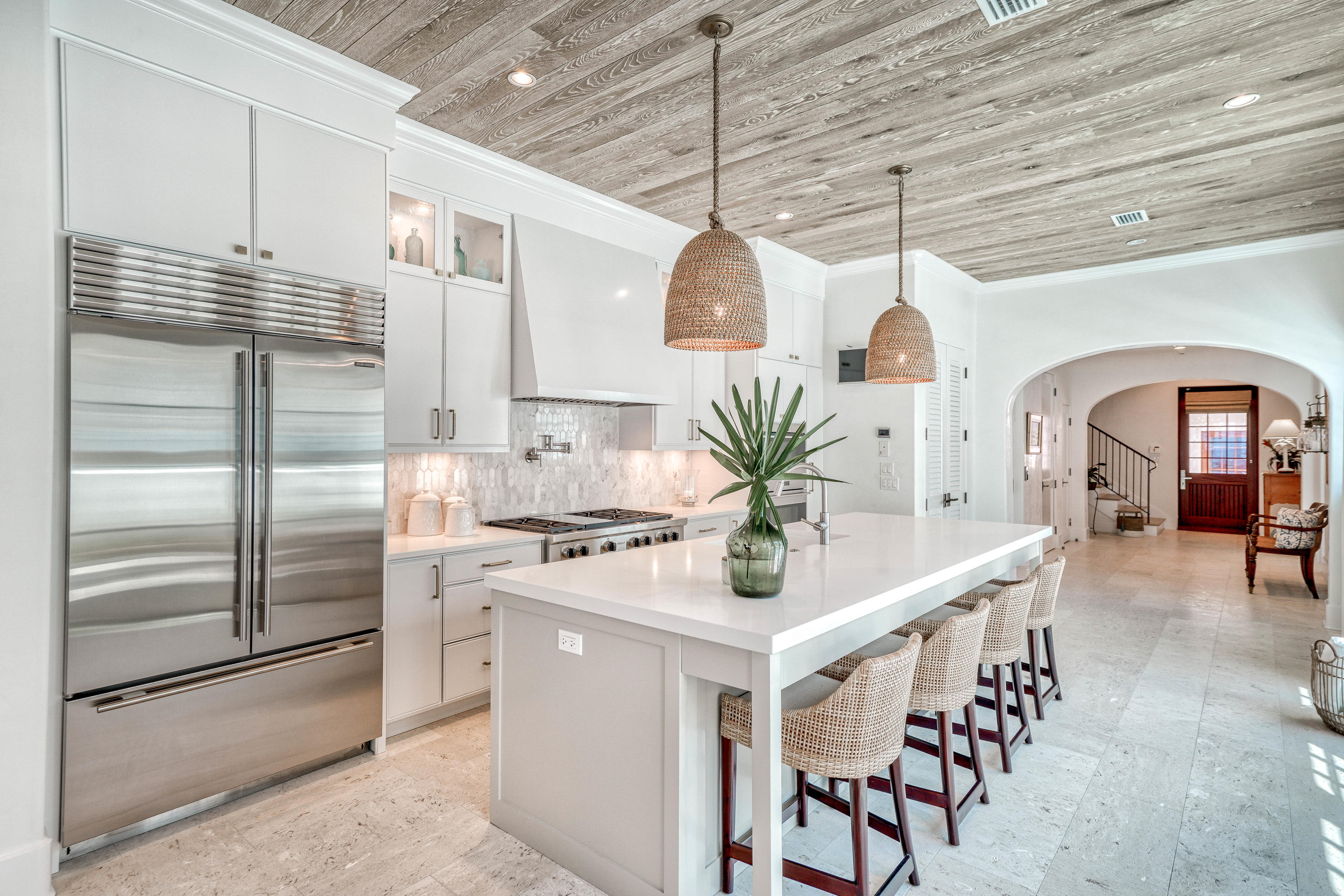 153 Pelican Cir Inlet Beach, Unit A Inlet Beach, FL 32461 - Photo 19 of 94 a kitchen with stainless steel appliances kitchen island granite countertop a stove a sink and a refrigerator
