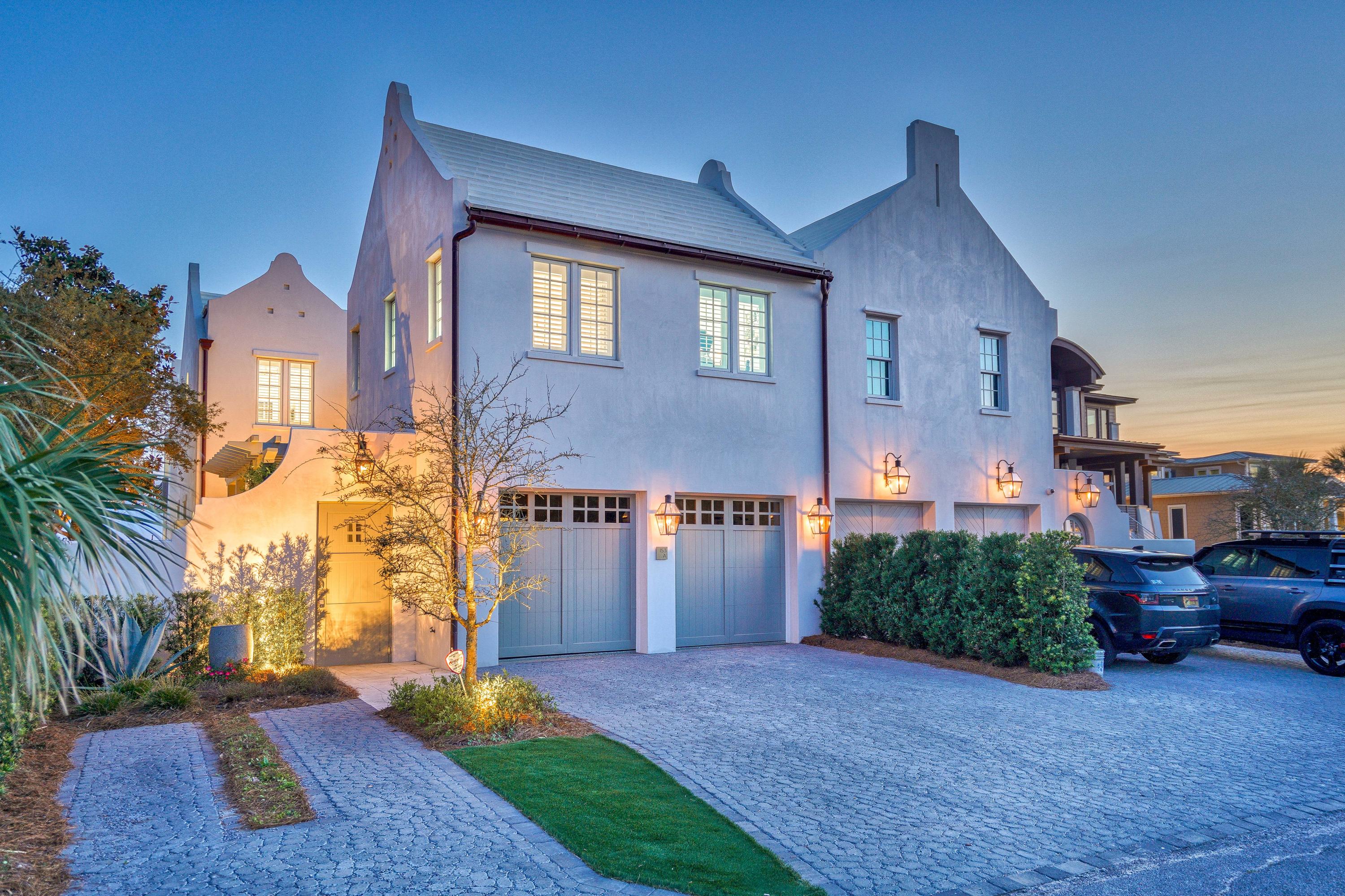 153 Pelican Cir Inlet Beach, Unit A Inlet Beach, FL 32461 - Photo 2 of 94 a front view of a house with a yard