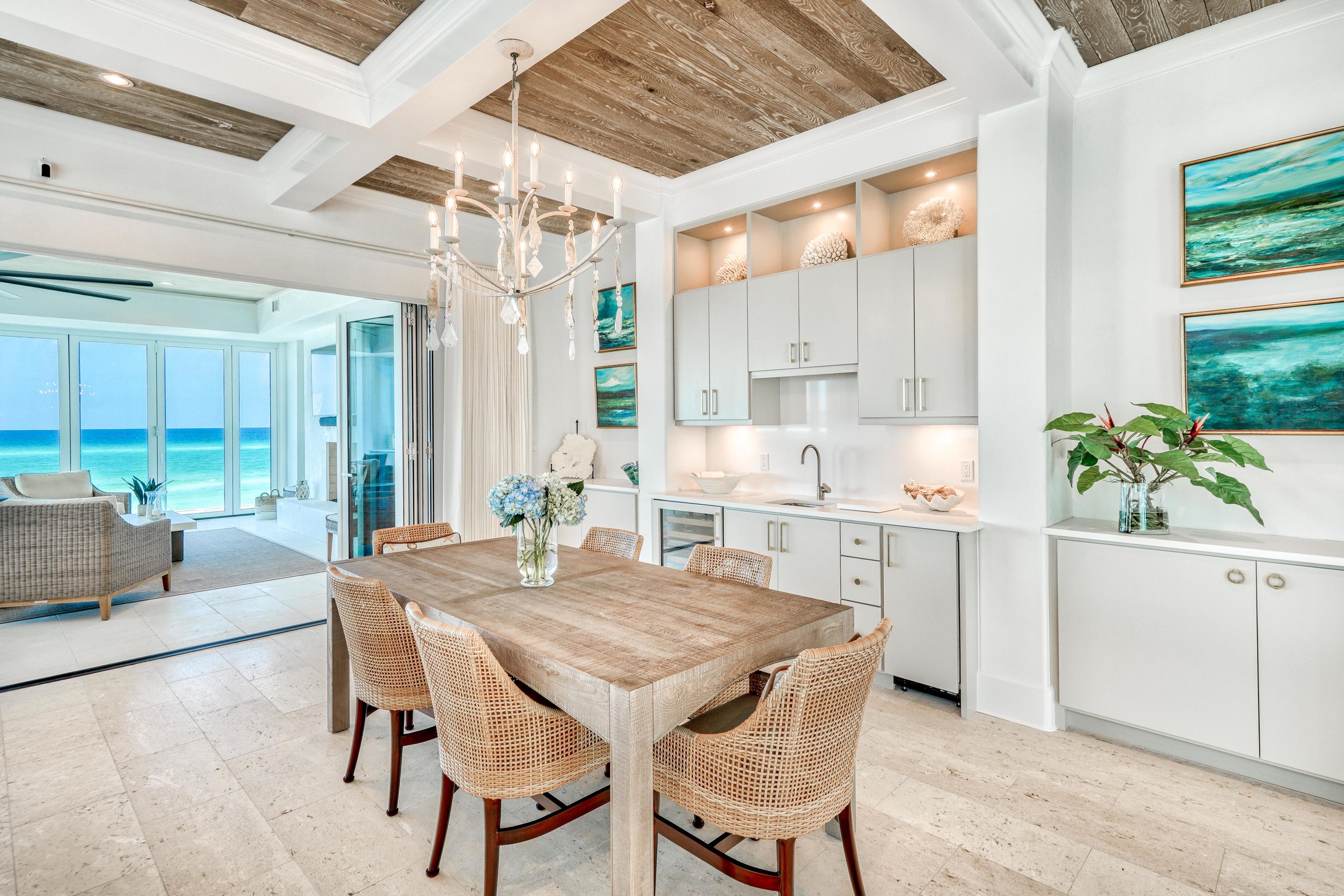 153 Pelican Cir Inlet Beach, Unit A Inlet Beach, FL 32461 - Photo 29 of 94 a view of a dining room with furniture and a potted plant