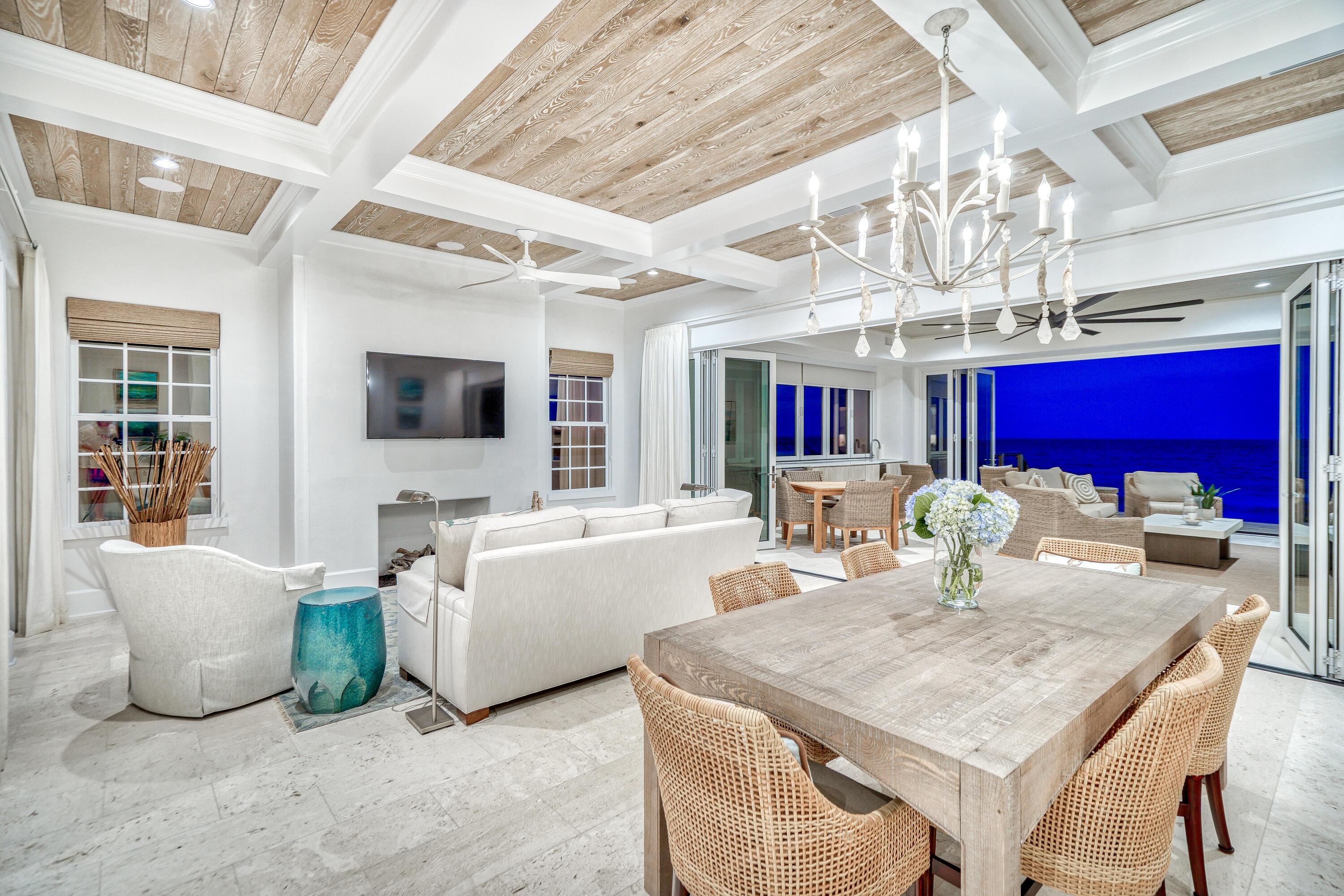 153 Pelican Cir Inlet Beach, Unit A Inlet Beach, FL 32461 - Photo 41 of 94 a view of a dining room with furniture a chandelier and kitchen view