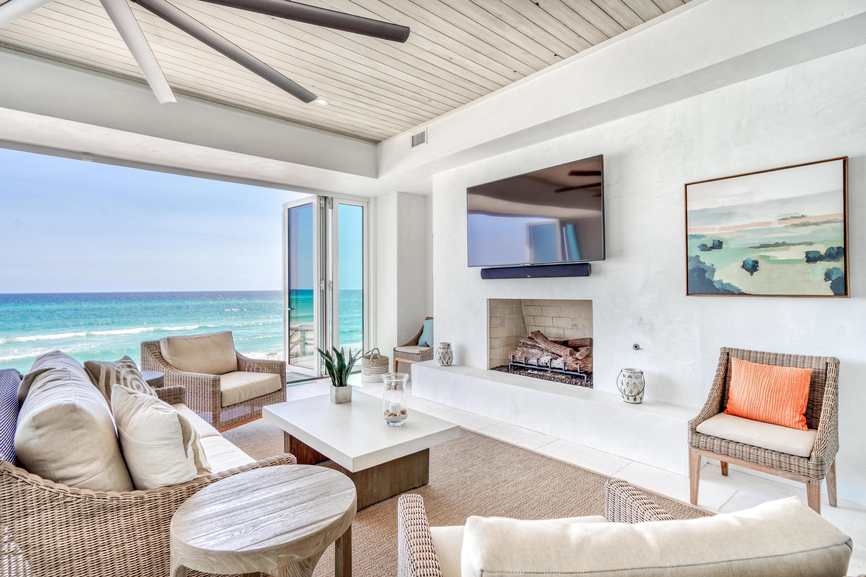 153 Pelican Cir Inlet Beach, Unit A Inlet Beach, FL 32461 - Photo 43 of 94 a living room with furniture and a fireplace