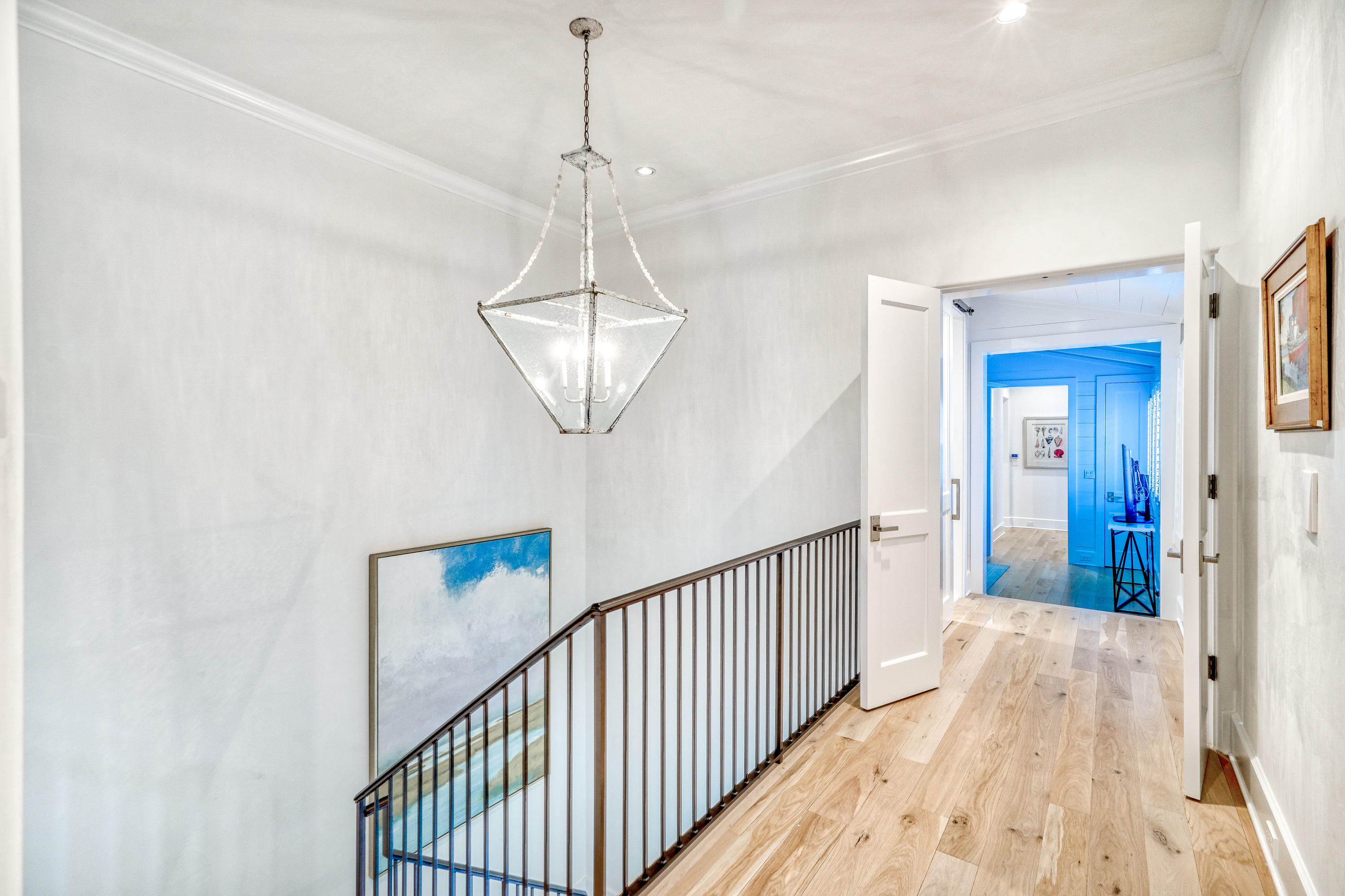153 Pelican Cir Inlet Beach, Unit A Inlet Beach, FL 32461 - Photo 55 of 94 a view of a hallway with a chandelier