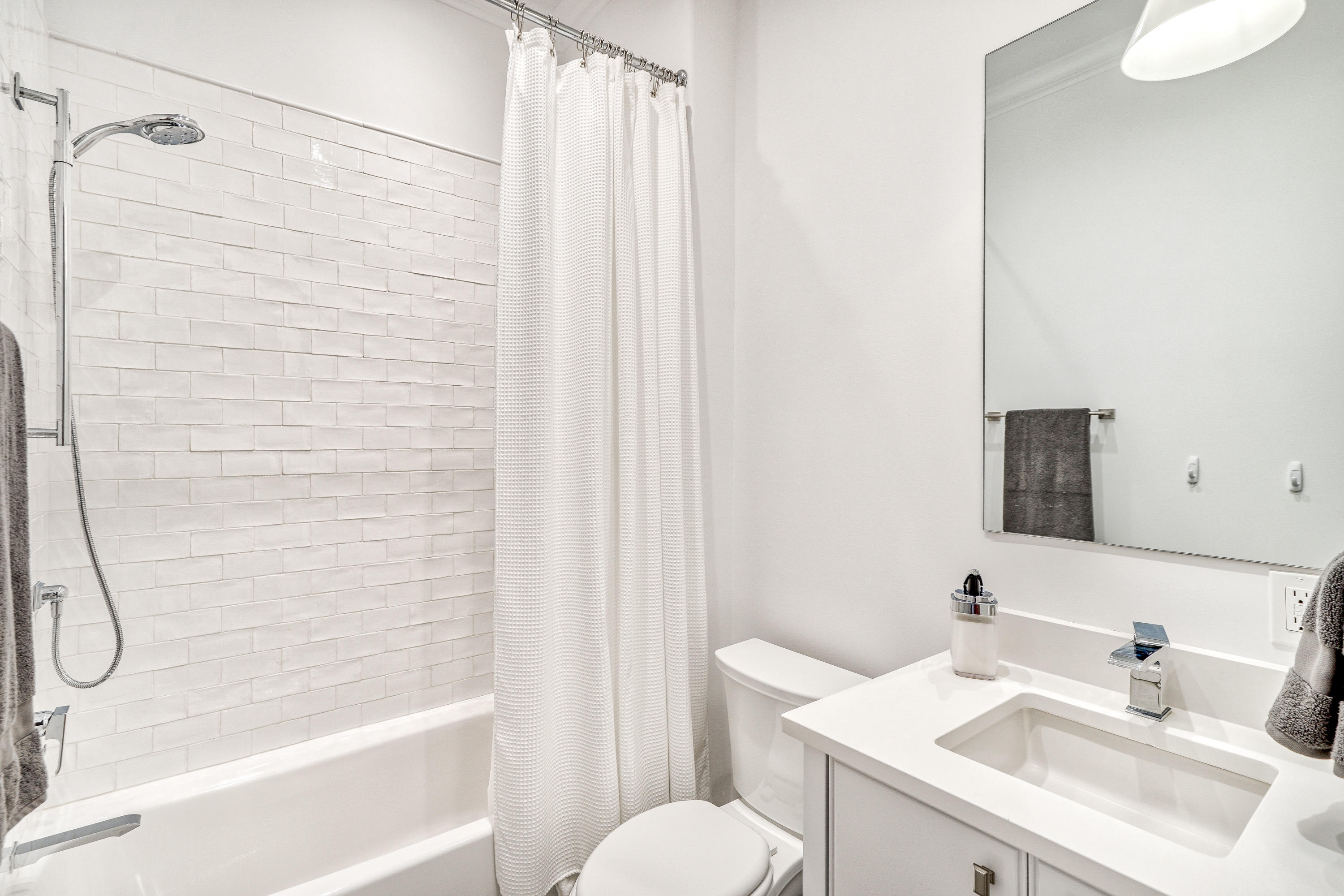 153 Pelican Cir Inlet Beach, Unit A Inlet Beach, FL 32461 - Photo 79 of 94 a bathroom with a sink toilet and shower