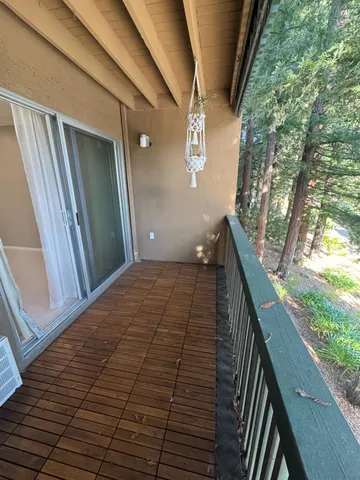 a balcony view with an outdoor space