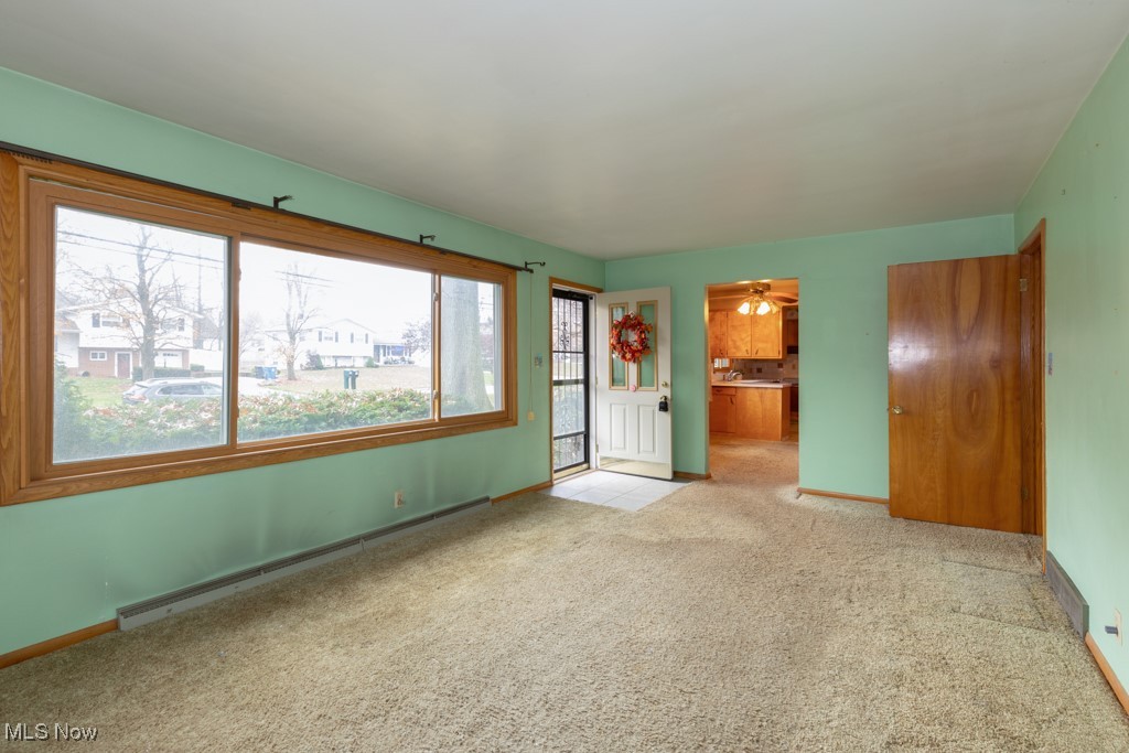 2837 Shellhart Road Barberton, OH 44203 - Photo 3 of 25 Spacious room with lots of natural light!