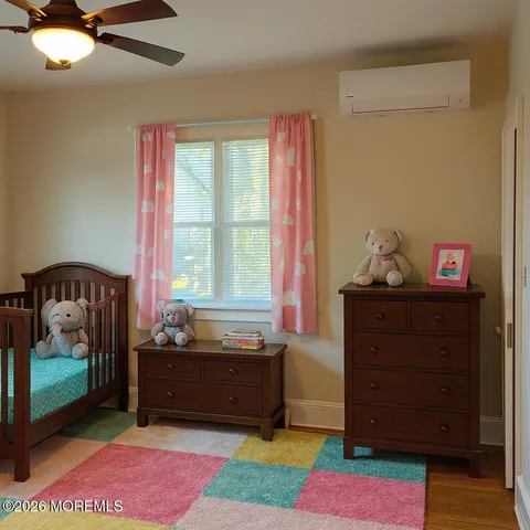 a bed room with a bed and a window