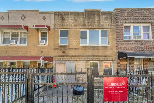 a front view of a building with glass windows
