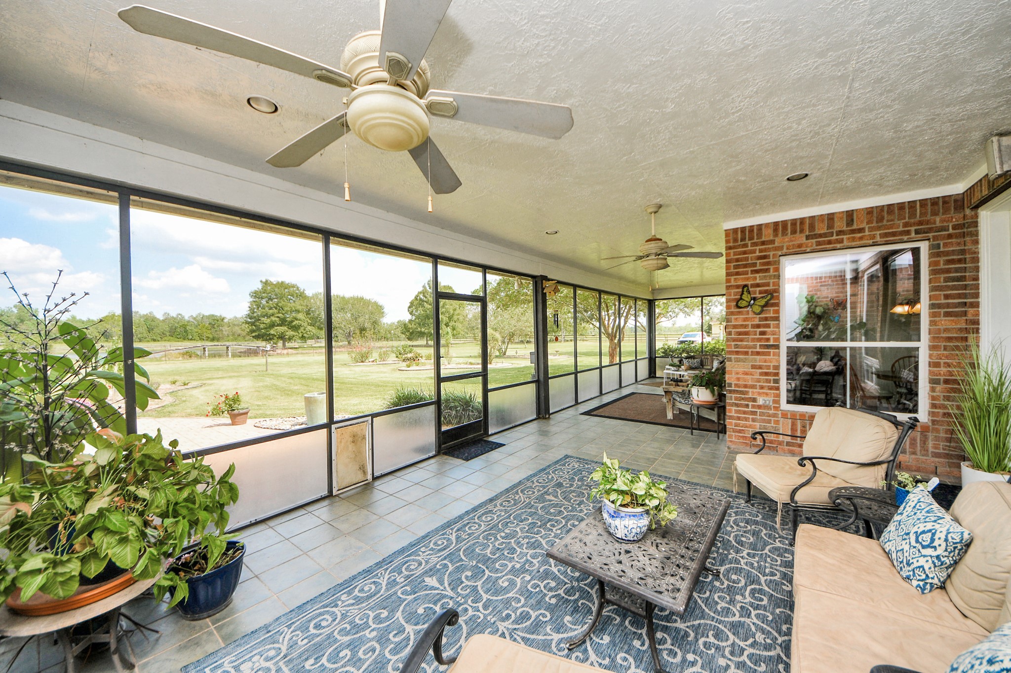7511 County Road 511 Rosharon, TX 77583 - Photo 31 of 42 Enjoy serene views from the screened porch.