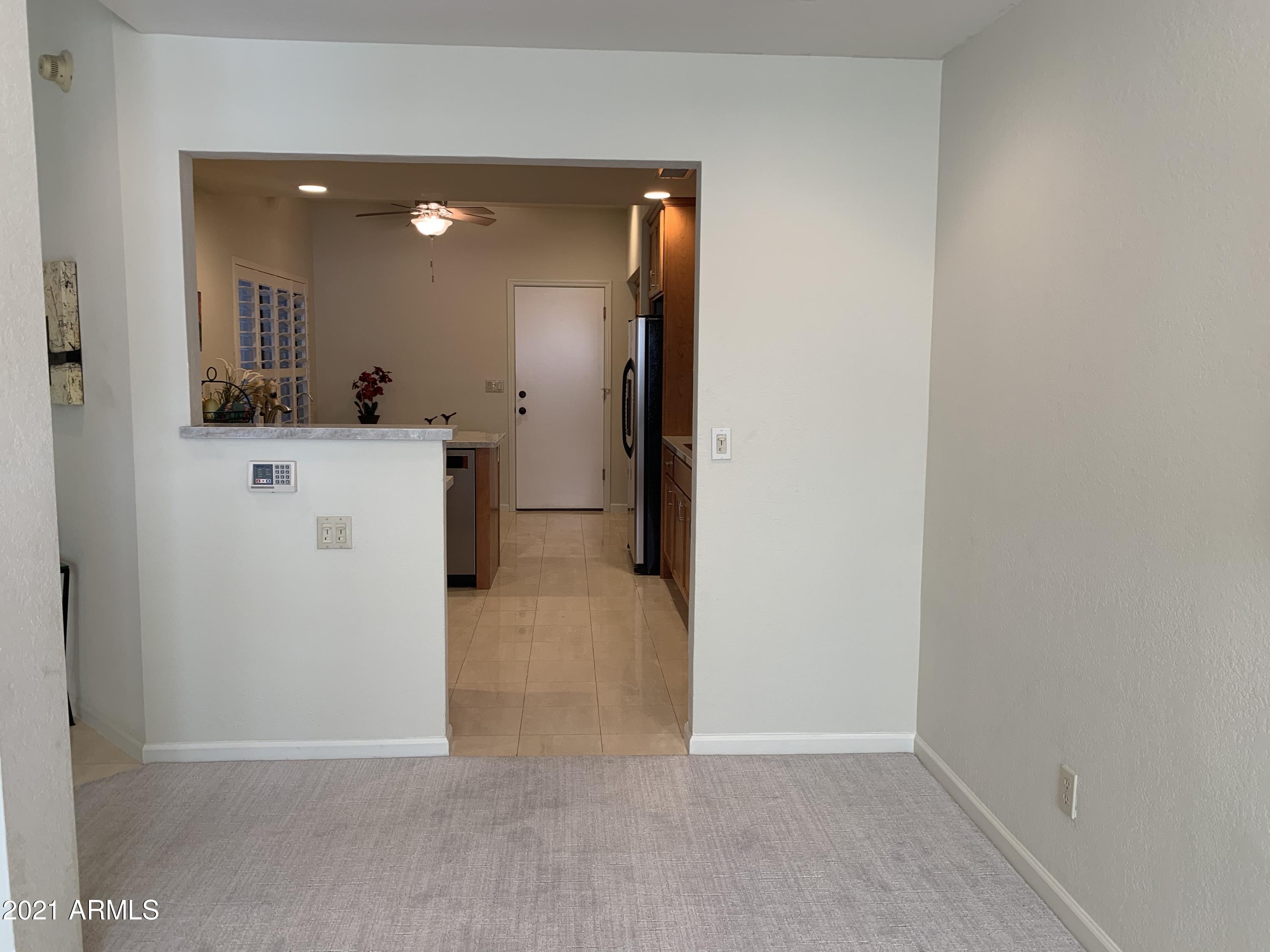 7272 East Gainey Ranch Road, Unit 114 Scottsdale, AZ 85258 - Photo 12 of 70 ENTRY INTO KITCHEN