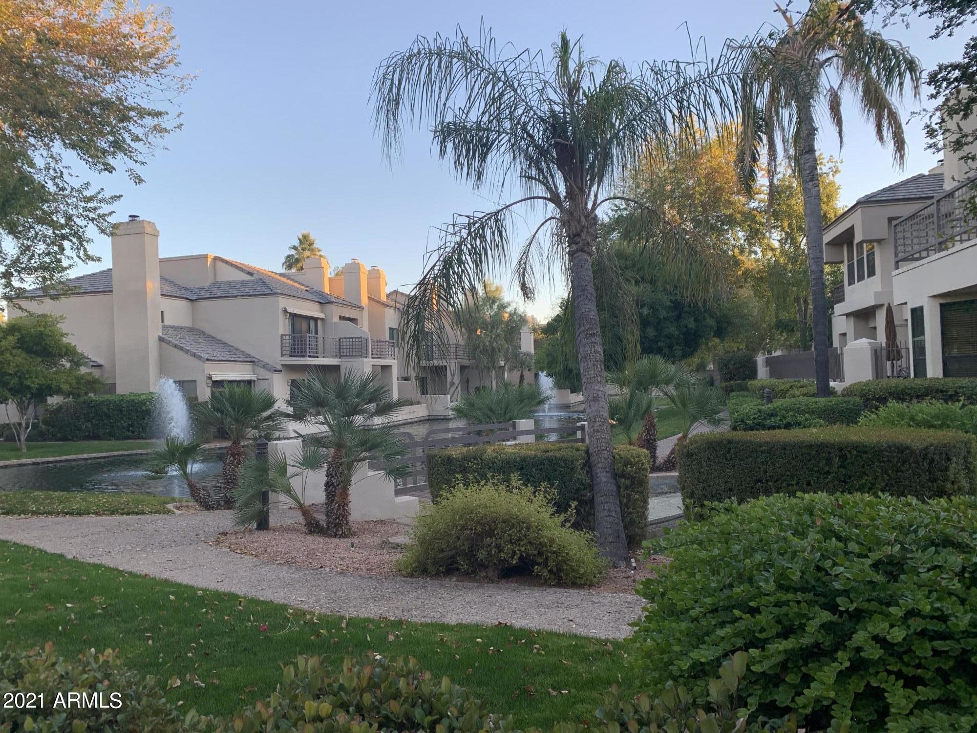 7272 East Gainey Ranch Road, Unit 114 Scottsdale, AZ 85258 - Photo 23 of 70 WALK WAY TO COMM POOL FROM PATIO